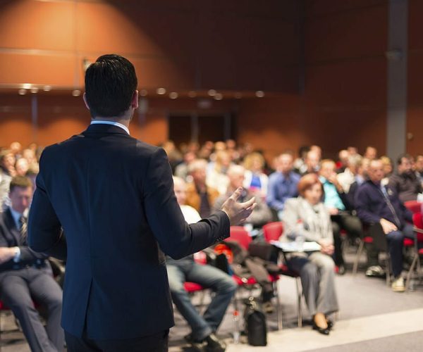conference Speaker at Business Conference and Presentation. Audience at the conference hall.